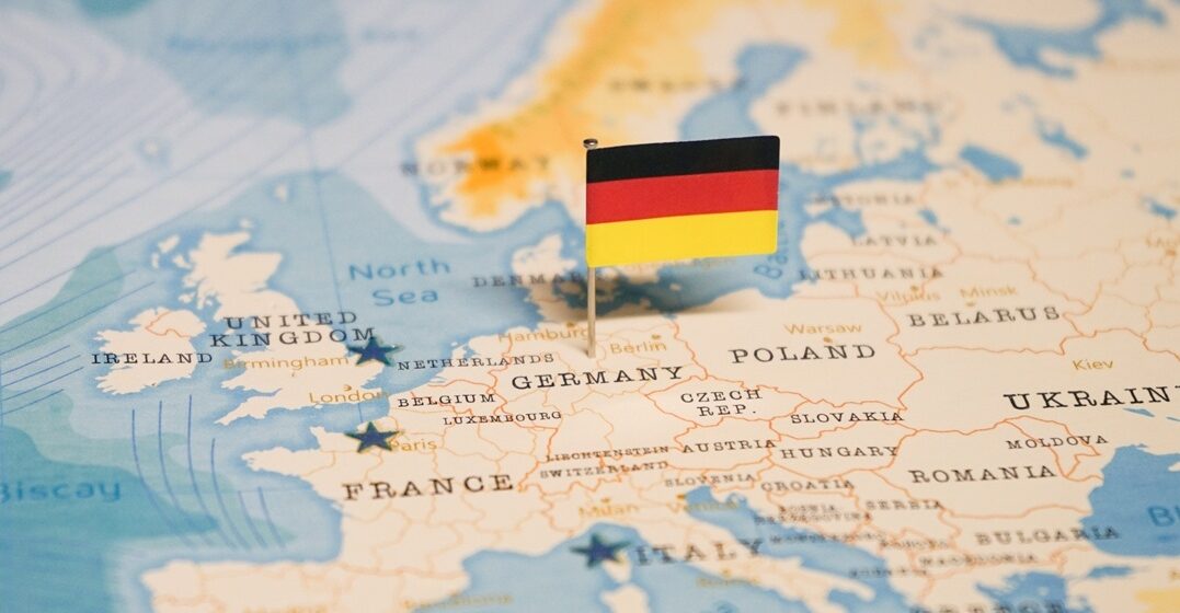 map of germany with german flag, to symbolize the german language origins