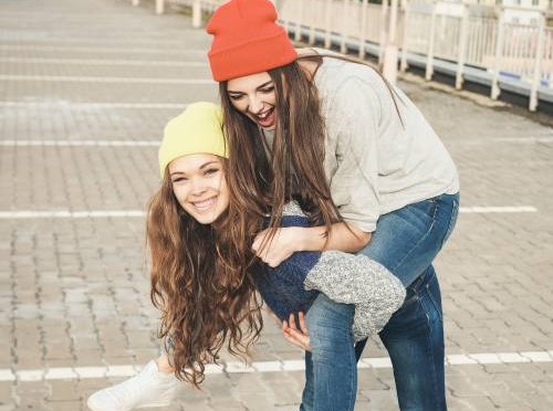 Two young girls having fun