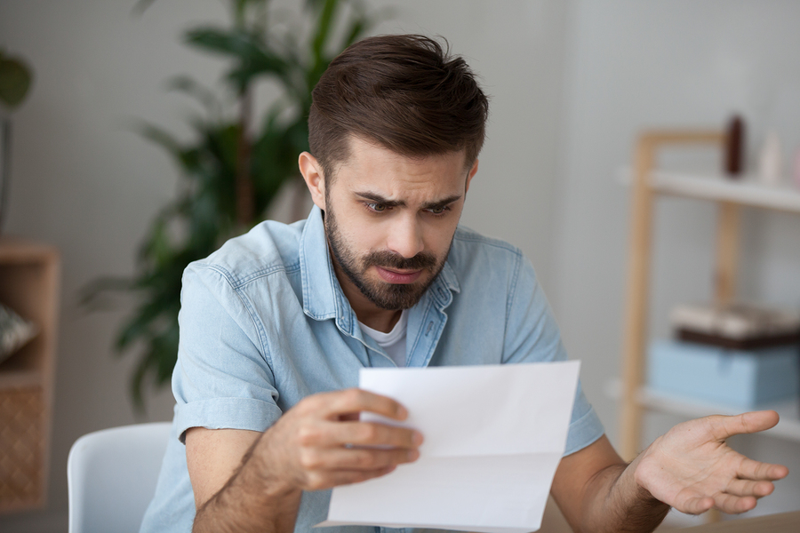 man confused by German letter with lots of abbreviations